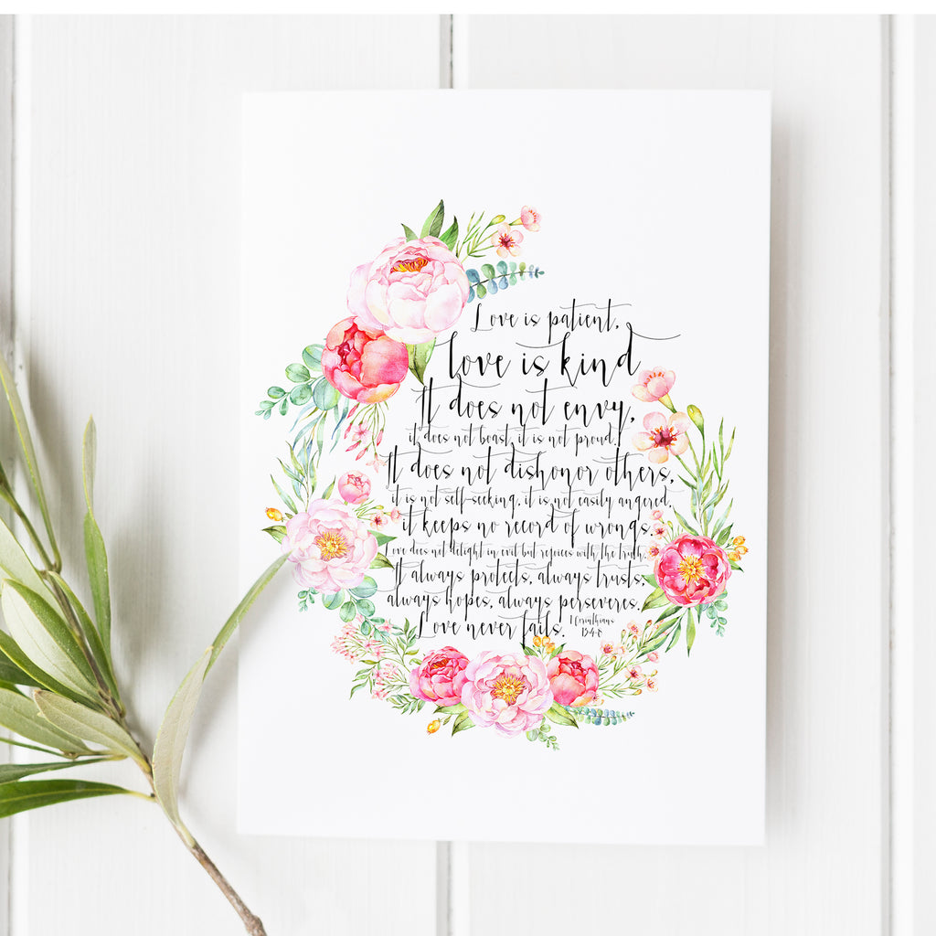 Love is Patient, Love is Kind Christmas Card featuring 1 Corinthians 13 with a delicate floral wreath, perfect as a meaningful Christmas gift or holiday home decor accent.