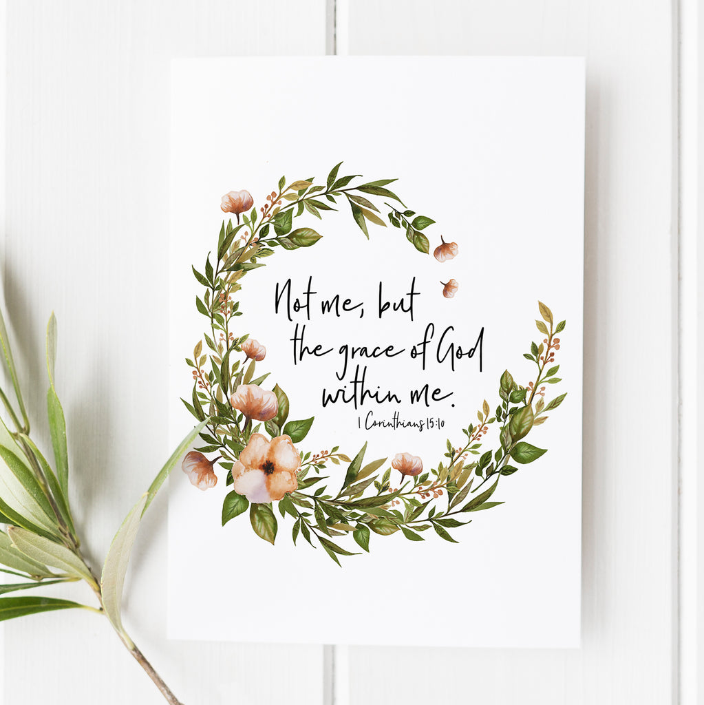 Christian Christmas card with 'Not Me, But the Grace of God Within Me' scripture in delicate wreath design, perfect faith-based gift, inspirational wall decor for Christmas