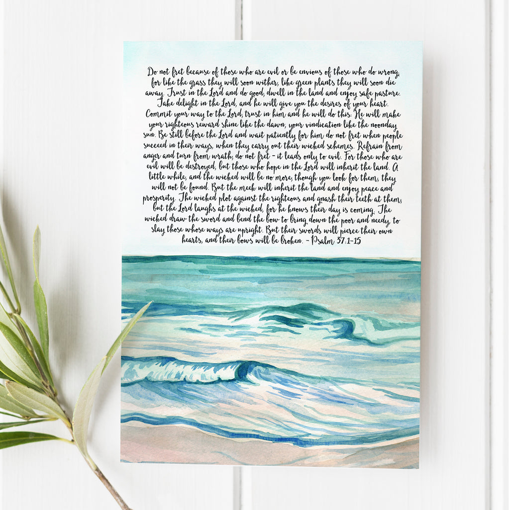 Bible Verse art print from SNow and Company featuring Psalm 37:1-15. The verse is written ina a hand-lettered script font and the background is a watercolor beach scene.